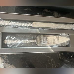 Never been used Waterford  cake knife and server